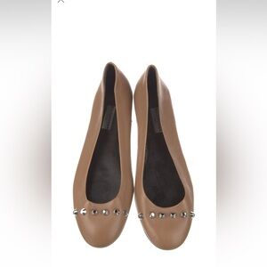 Balenciaga nude ballet flats with metal stud accents on toe